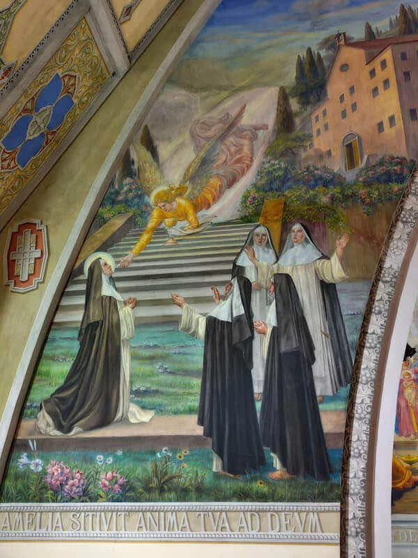 Un angelo porta la comunione a sant’Amélie davanti alle religiose
