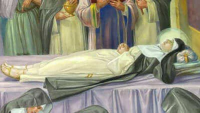 Sant’Amélie esposta su un letto funebre
